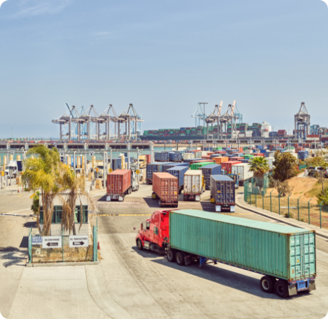 Trucks carrying containers.